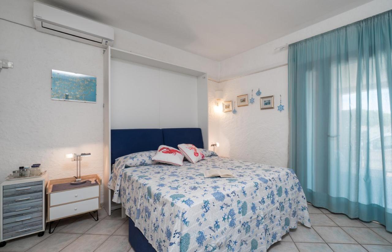 Sardinia Family Villas - Cannigione Beach Apartments מראה חיצוני תמונה